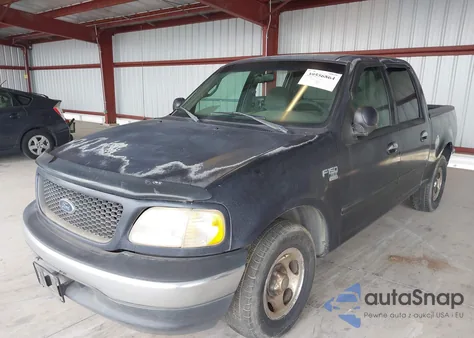 2001 Ford F150 Supercrew из США, поврежденный, VIN 1FTRW07W01KE24526